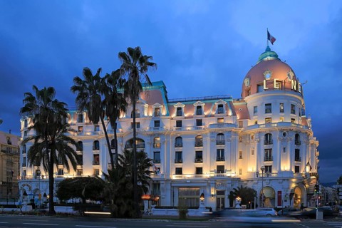 Hotel Le Negresco on the Promenade des Anglais in the evening