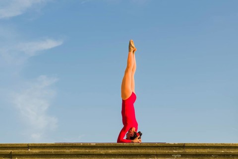 Young woman practising Hatha yoga