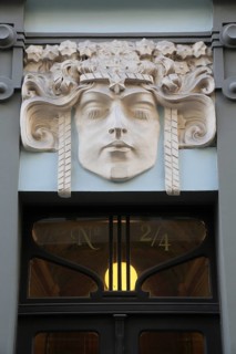 House entrance with Art Nouveau stucco mask