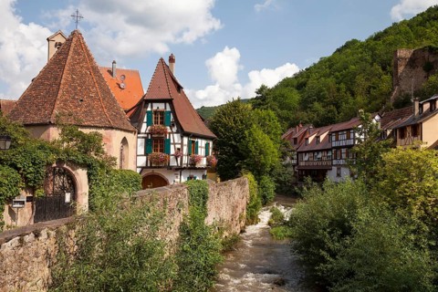 Oberhof Chapel and half-timbered houses on the river Weiss