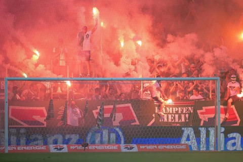 Fans of SK Rapid celebrate the last game at Gerhard Hanappi Stadium before its demolition
