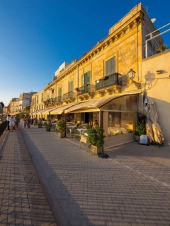 Restaurants on the promenade of the historic centre of Syracuse