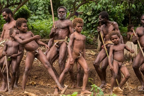 Men and boys of the Sa people dancing at the Land diving ceremony