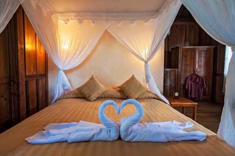 Bed in Palm Bungalow
