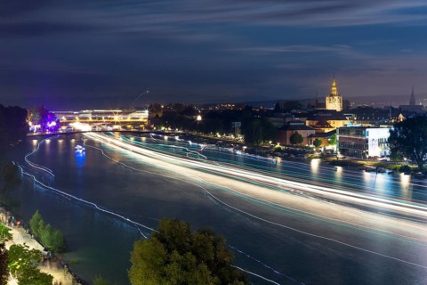 Light tracers of ships on the Rhine River during the Seenachtfest Festival