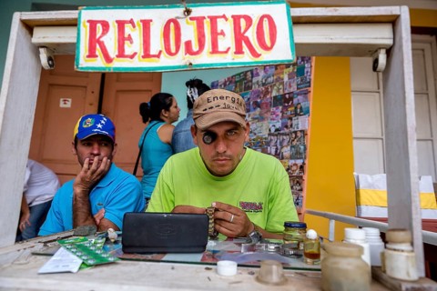 Watchmaker with their street workshop
