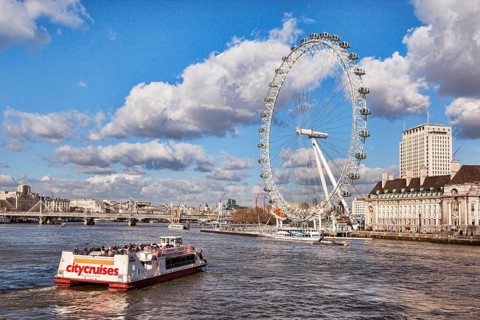 City Cruises riverboat approaching the London Eye