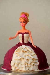 A princess cake moulded on to a Barbie doll