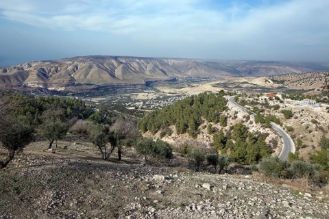 View across the fertile Jordan Valley with the the Golan Heights at the back