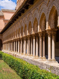 Cloister with ornate pillars in the Cathedral of Monreale or Santa Maria Nuova