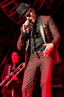 The German rapper and musician Jan Delay with band performing live at Heitere Open Air