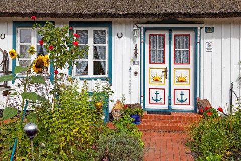 Typical house entrance with bench