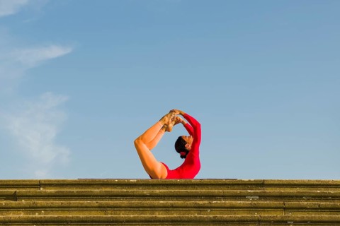 Young woman practising Hatha yoga
