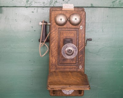 Old telephone with crank in the Museum City