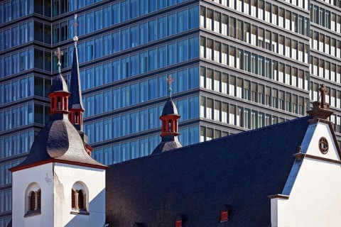 Alt St. Heribert Church in front of Lanxess AG Headquarters