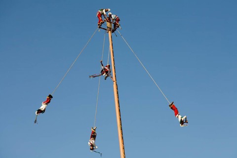 Voladores performing at a village festival