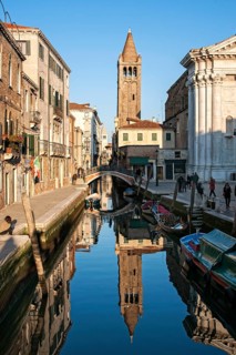 Rio de San Barnaba canal with reflections in the evening light