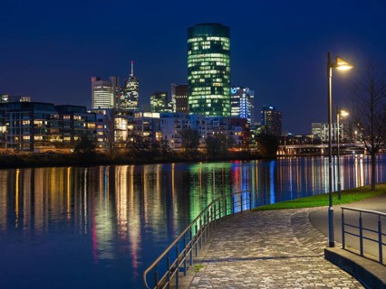 Theodor-Stern-Kai with a view of the skyline of Frankfurt and the Westhafen Tower of the OFB