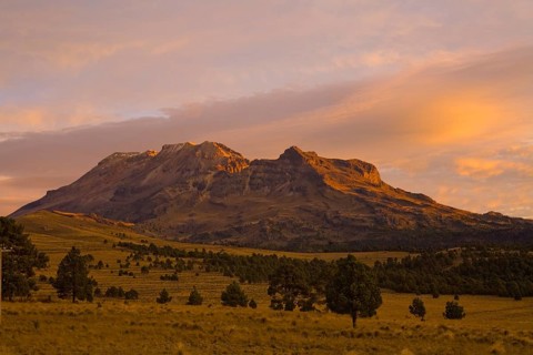 Extinct Volcano Iztaccihuatl in the early morning light from Paso de Cortes