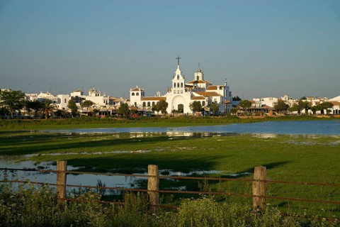 Hermitage of El Rocio in the lagoon of the Donana National Park