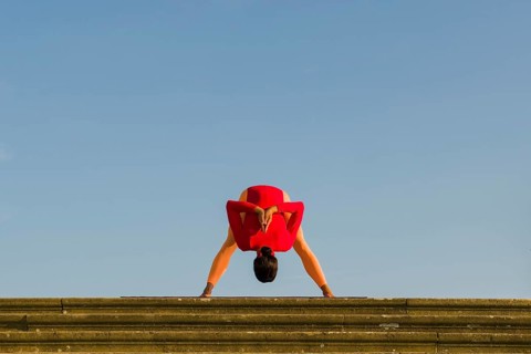 Young woman practising Hatha yoga