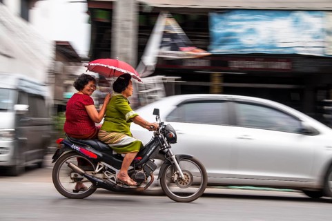 Two women on a motorcycle