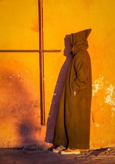 A Moroccan man wearing a typical Djellaba