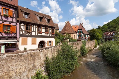 Oberhof Chapel and half-timbered houses on the river Weiss