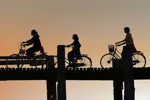 Silhouettes of cyclists