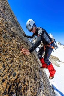 Climber climbing on a rock wall