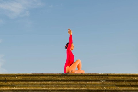 Young woman practising Hatha yoga