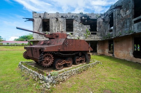 Old Japanese tank in front of the Japanese administration building