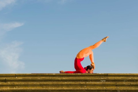 Young woman practising Hatha yoga