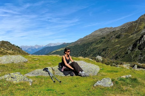 Woman resting after a mountain hike