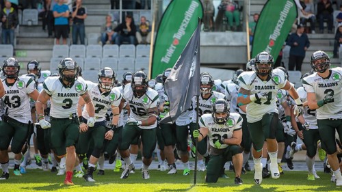 The team of the Danube Dragons runs on the field before an Austrian Football League game