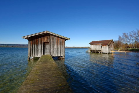 Boathouses on Lake Kochel or Kochelsee Lake