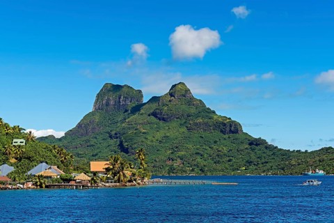 Harbour of Faanui in front of the Mont Otemanu volcano