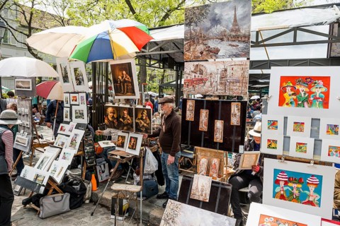 Painter sells pictures at Place du Tertre