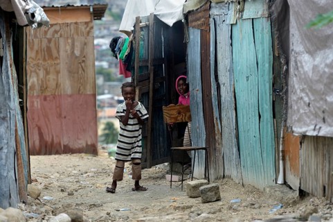 Children in front of a shack