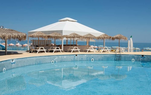 Swimming pool and cafe on the beach in Golden Sands resort