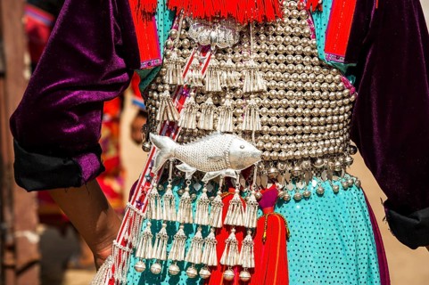 Traditionally decorated dress a woman from the Lisu people