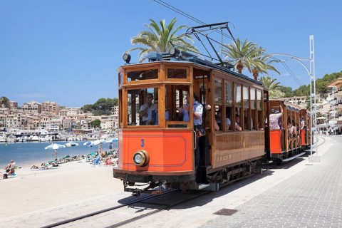The historic ""Red Lightning"" tram on the promenade