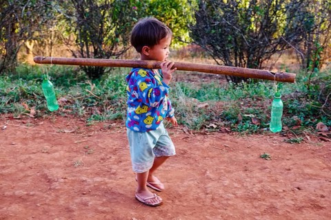 Boy fetching water