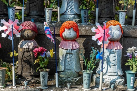 Jizo statues with red caps