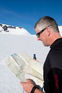 Mountaineer with orientation map