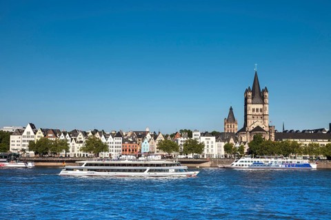 View over the Rhine of the historic centre with Great St. Martin Church and City Hall