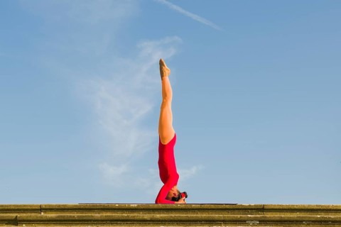 Young woman practising Hatha yoga