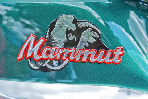 The logo on the motorcycle tank of the Munch 4 Mammut TTS-E