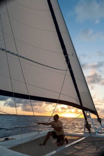 Skipper checking the tension of the sails