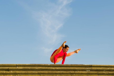 Young woman practising Hatha yoga